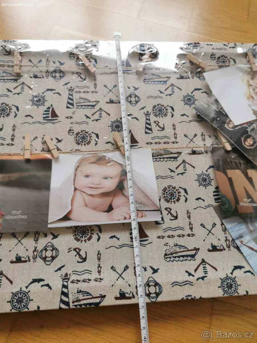 Na fotky. Plátno na pověšení fotek. Úplně nové, nakonec nevyužijeme