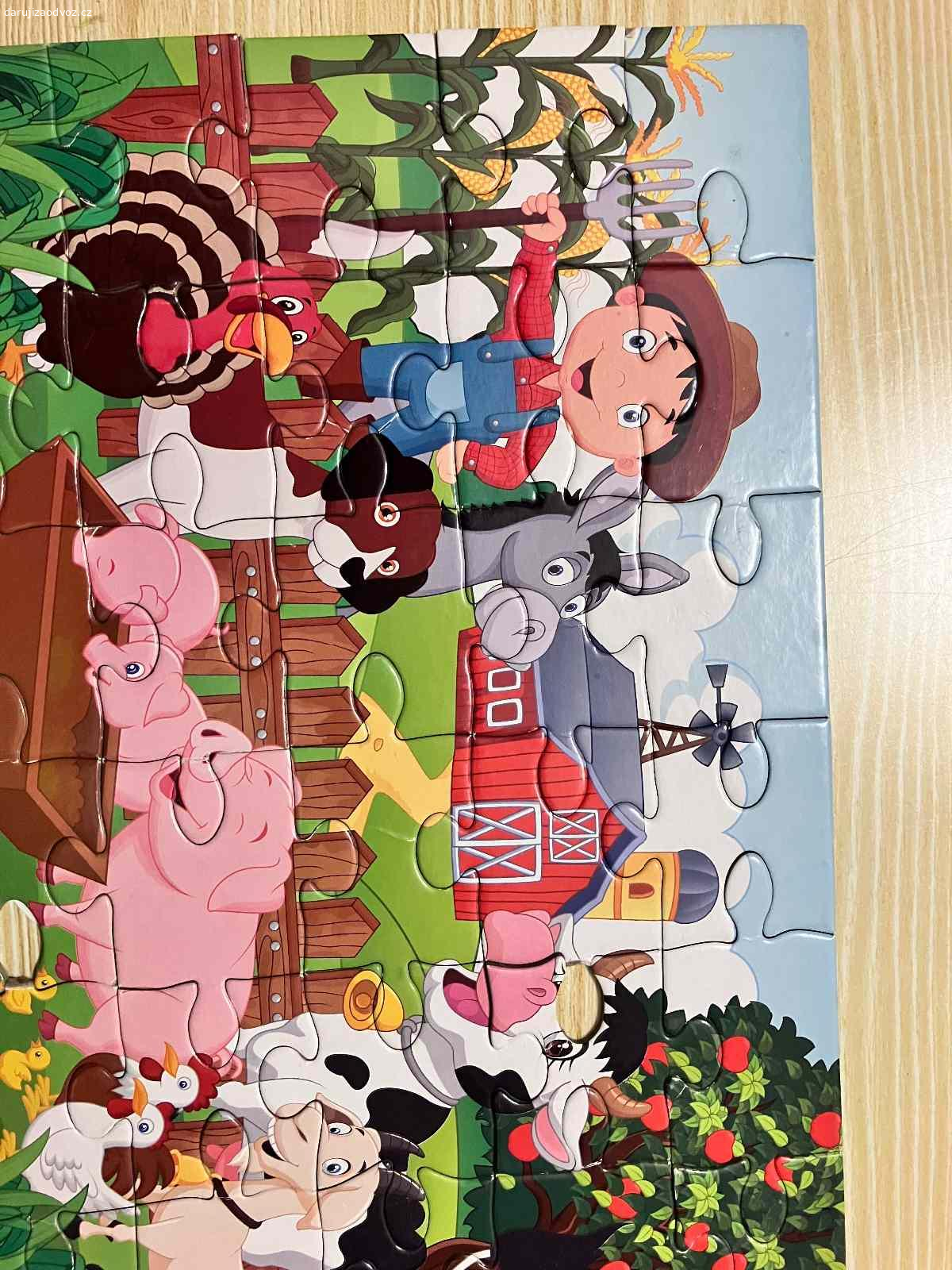 Puzzle pro děti. Daruji puzzle pro děti, jsou hrané, u pejska chybí jedna kostička.