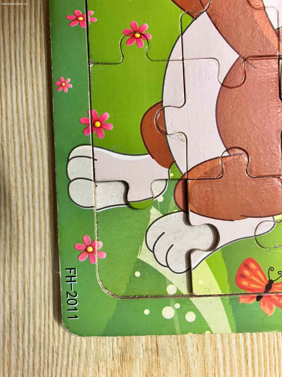 Puzzle pro děti. Daruji puzzle pro děti, jsou hrané, u pejska chybí jedna kostička.