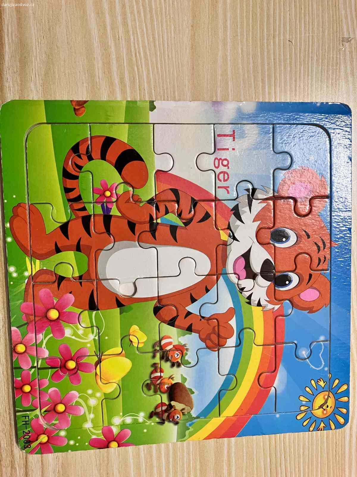 Puzzle pro děti. Daruji puzzle pro děti, jsou hrané, u pejska chybí jedna kostička.