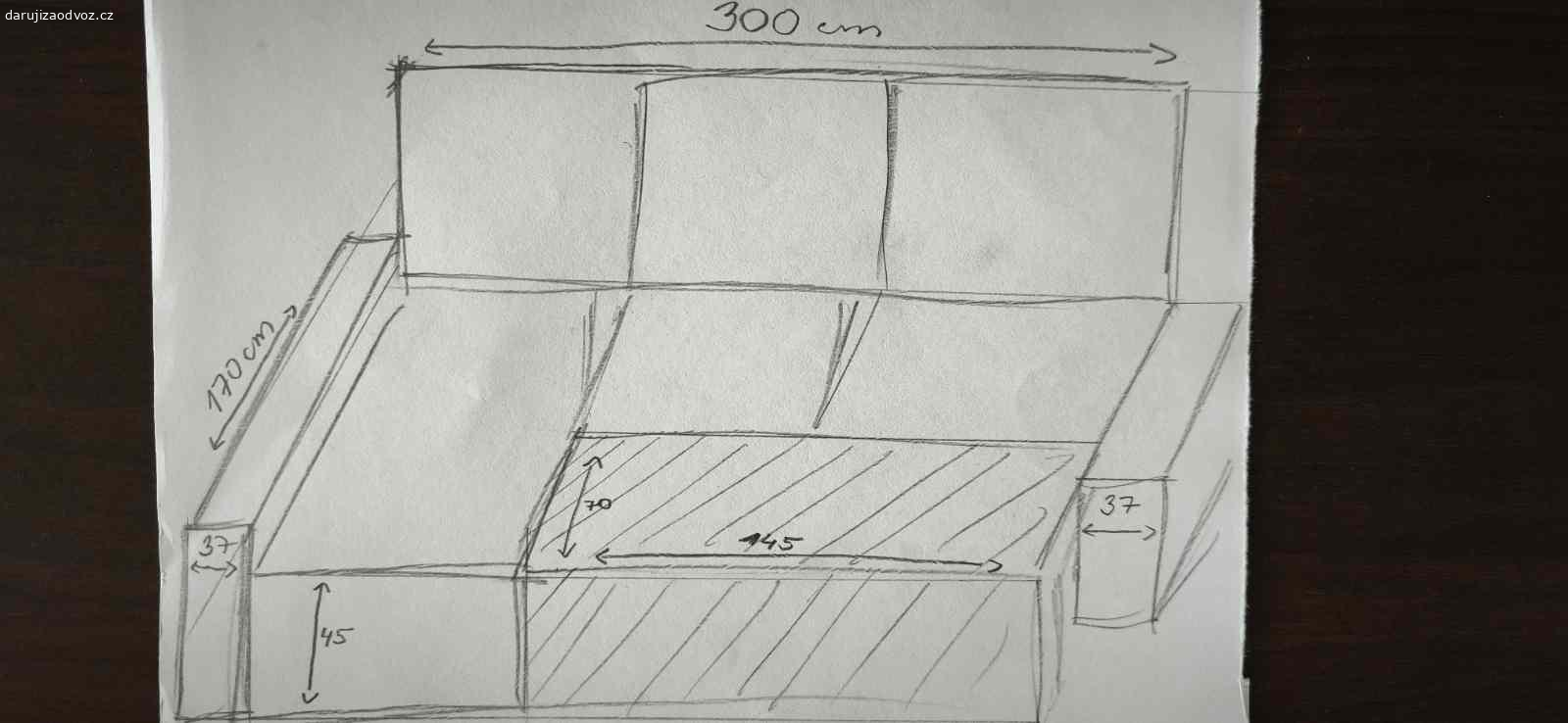 Rozkládací sedačka za odvoz. Daruji za odvoz rozkládací sedačku. Používaná spoustu let, ale ještě dobře poslouží. Rozkládání plně funkční, jen z jedné strany vytrhaná od koček viz foto. Potahy na 3 velké polštáře jsou na zip, snimatelné a pratelné. 
Rozměry viz foto:
šířka - 300 cm
hloubka - 170 cm
výška zadní části - 76 cm
Plocha na spaní - 220 x 145 cm
Je třeba rozložit na dvě celkem těžké části, je tedy potřeba silné osoby k manipulaci.